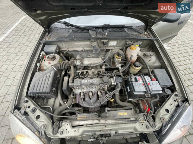 Бежевый Дэу Ланос, объемом двигателя 1.5 л и пробегом 200 тыс. км за 2000 $, фото 8 на Automoto.ua