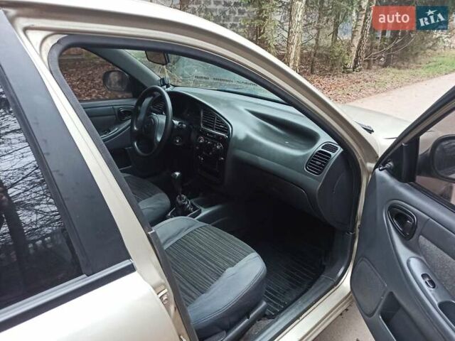 Бежевый Дэу Ланос, объемом двигателя 1.5 л и пробегом 198 тыс. км за 1850 $, фото 13 на Automoto.ua