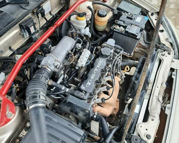 Бежевый Дэу Ланос, объемом двигателя 1.5 л и пробегом 180 тыс. км за 2200 $, фото 4 на Automoto.ua