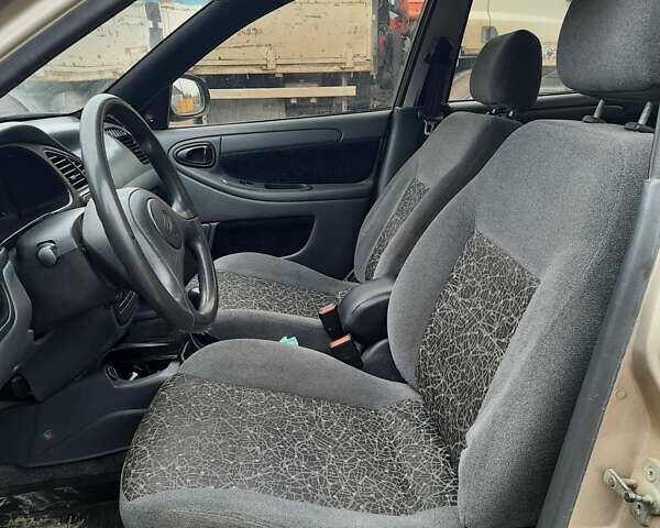 Бежевый Дэу Ланос, объемом двигателя 1.5 л и пробегом 180 тыс. км за 2200 $, фото 6 на Automoto.ua