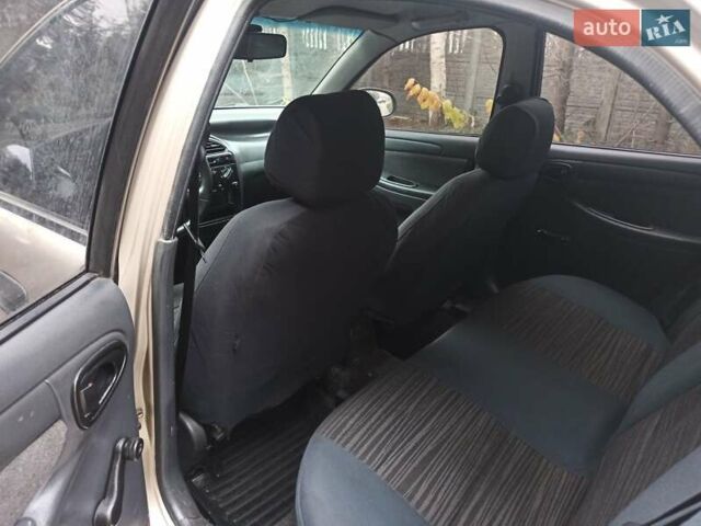 Бежевый Дэу Ланос, объемом двигателя 1.5 л и пробегом 198 тыс. км за 1850 $, фото 6 на Automoto.ua