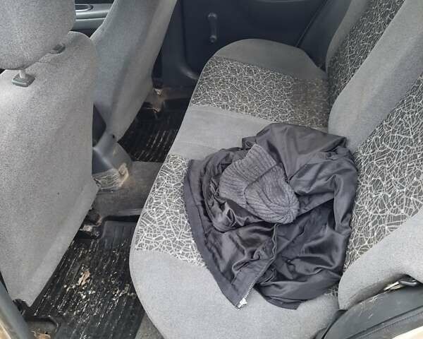 Бежевый Дэу Ланос, объемом двигателя 1.5 л и пробегом 180 тыс. км за 2200 $, фото 7 на Automoto.ua