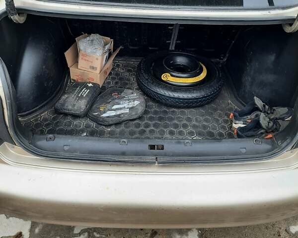 Бежевый Дэу Ланос, объемом двигателя 1.5 л и пробегом 180 тыс. км за 2200 $, фото 9 на Automoto.ua