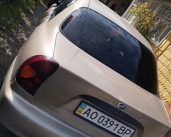 Бежевый Дэу Ланос, объемом двигателя 1.5 л и пробегом 76 тыс. км за 3400 $, фото 4 на Automoto.ua