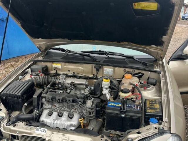 Бежевый Дэу Ланос, объемом двигателя 1.5 л и пробегом 170 тыс. км за 3650 $, фото 6 на Automoto.ua