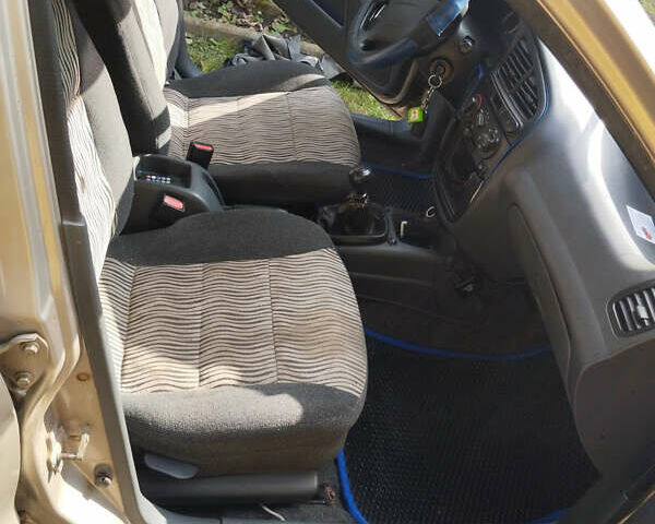 Бежевый Дэу Ланос, объемом двигателя 1.5 л и пробегом 76 тыс. км за 3400 $, фото 8 на Automoto.ua