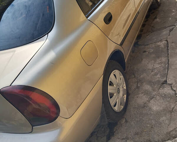 Бежевый Дэу Ланос, объемом двигателя 1.5 л и пробегом 76 тыс. км за 3400 $, фото 3 на Automoto.ua