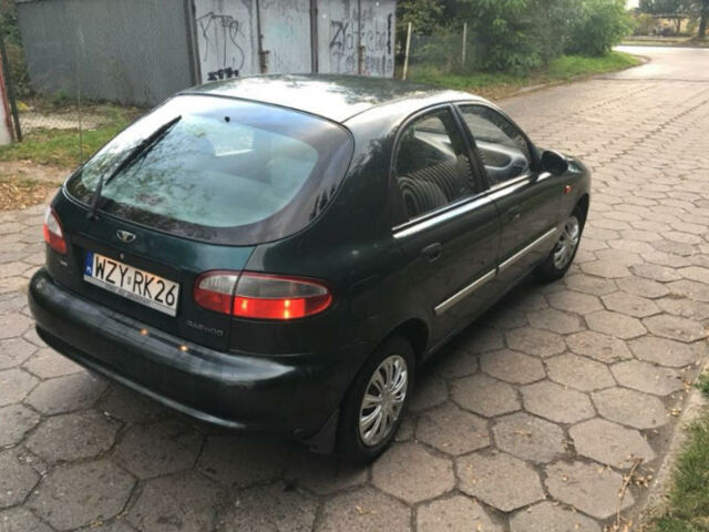 Черный Дэу Ланос, объемом двигателя 1.5 л и пробегом 107 тыс. км за 1300 $, фото 3 на Automoto.ua
