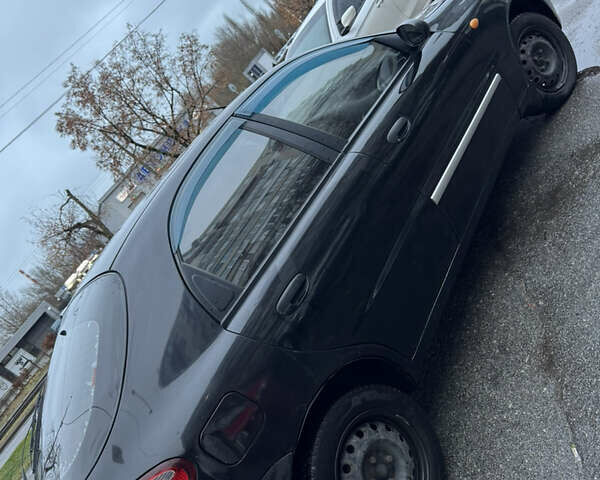 Черный Дэу Ланос, объемом двигателя 1.5 л и пробегом 350 тыс. км за 2450 $, фото 4 на Automoto.ua