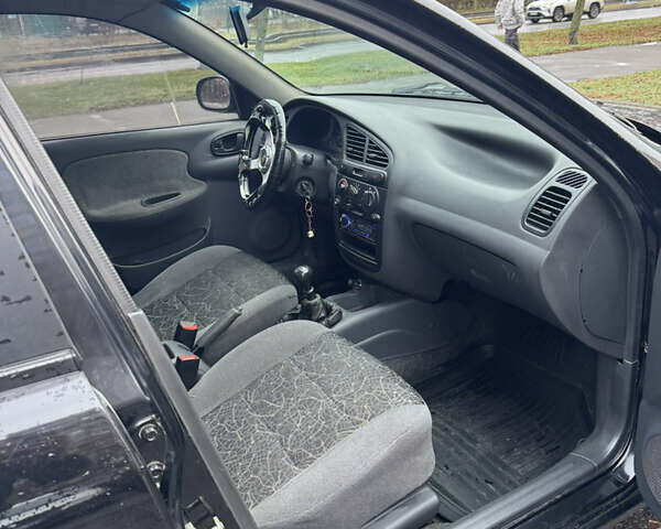 Черный Дэу Ланос, объемом двигателя 1.5 л и пробегом 350 тыс. км за 2450 $, фото 10 на Automoto.ua