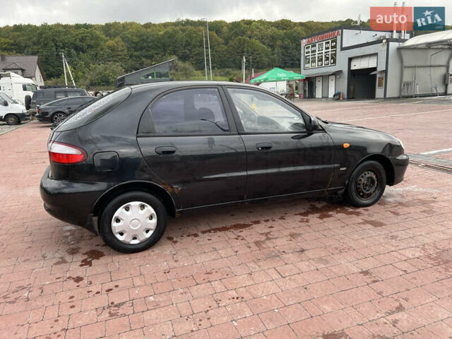 Чорний Деу Ланос, об'ємом двигуна 1.5 л та пробігом 189 тис. км за 1450 $, фото 8 на Automoto.ua