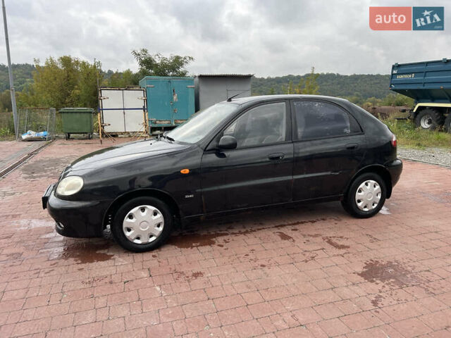 Чорний Деу Ланос, об'ємом двигуна 1.5 л та пробігом 189 тис. км за 1450 $, фото 2 на Automoto.ua
