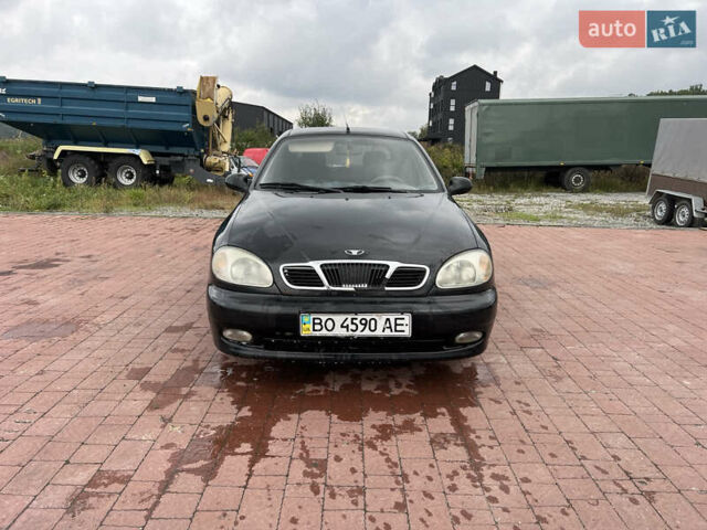 Чорний Деу Ланос, об'ємом двигуна 1.5 л та пробігом 189 тис. км за 1450 $, фото 1 на Automoto.ua