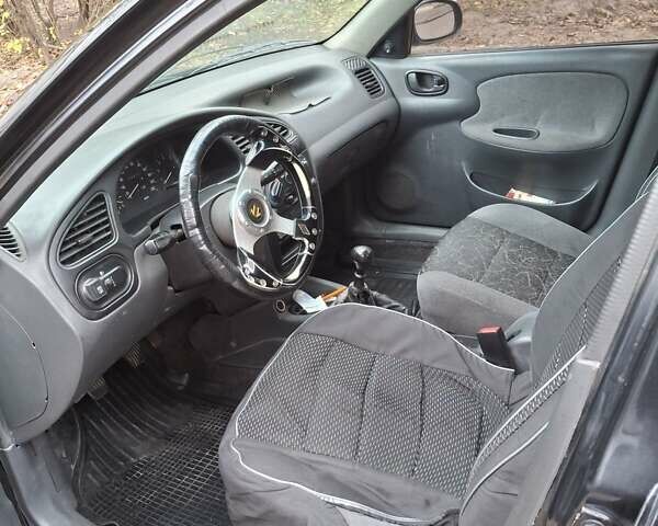 Черный Дэу Ланос, объемом двигателя 1.5 л и пробегом 366 тыс. км за 2300 $, фото 9 на Automoto.ua