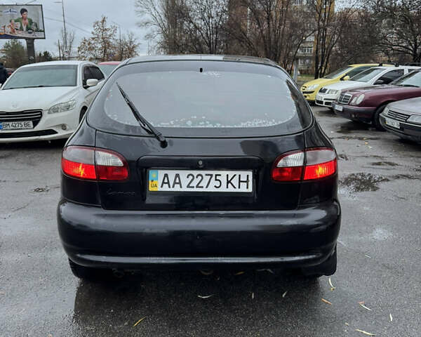 Черный Дэу Ланос, объемом двигателя 1.5 л и пробегом 350 тыс. км за 2450 $, фото 5 на Automoto.ua