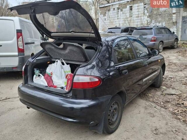 Черный Дэу Ланос, объемом двигателя 1.5 л и пробегом 366 тыс. км за 2300 $, фото 6 на Automoto.ua