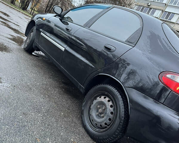 Черный Дэу Ланос, объемом двигателя 1.5 л и пробегом 350 тыс. км за 2450 $, фото 3 на Automoto.ua