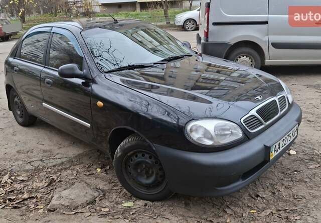 Черный Дэу Ланос, объемом двигателя 1.5 л и пробегом 366 тыс. км за 2300 $, фото 1 на Automoto.ua