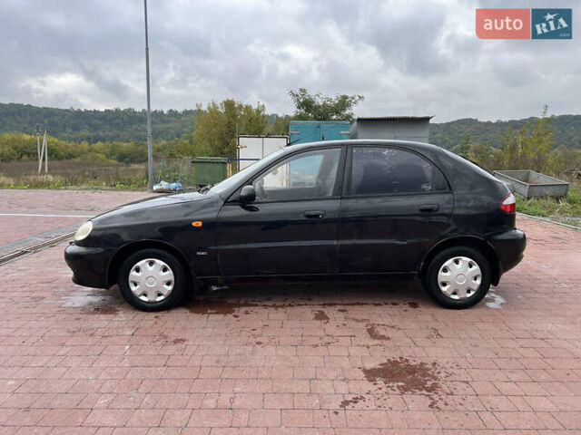 Чорний Деу Ланос, об'ємом двигуна 1.5 л та пробігом 189 тис. км за 1450 $, фото 3 на Automoto.ua