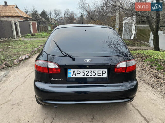 Чорний Деу Ланос, об'ємом двигуна 1.5 л та пробігом 210 тис. км за 3000 $, фото 2 на Automoto.ua