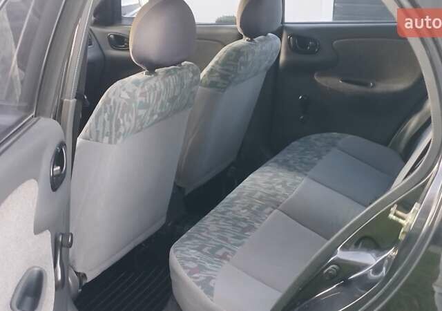 Черный Дэу Ланос, объемом двигателя 1.5 л и пробегом 145 тыс. км за 1950 $, фото 15 на Automoto.ua