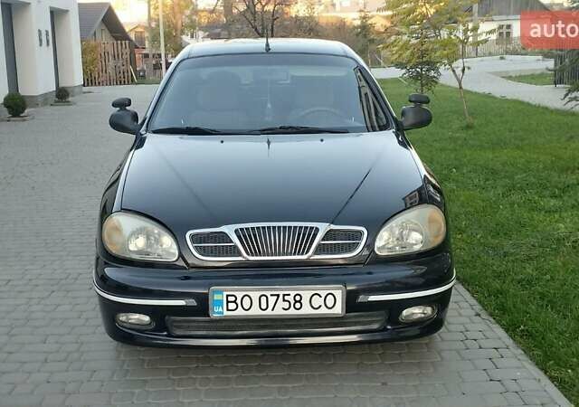 Черный Дэу Ланос, объемом двигателя 1.5 л и пробегом 145 тыс. км за 1950 $, фото 3 на Automoto.ua