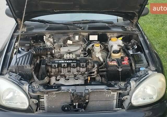 Черный Дэу Ланос, объемом двигателя 1.5 л и пробегом 145 тыс. км за 1950 $, фото 8 на Automoto.ua