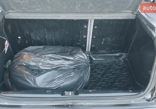 Черный Дэу Ланос, объемом двигателя 1.5 л и пробегом 145 тыс. км за 1950 $, фото 5 на Automoto.ua