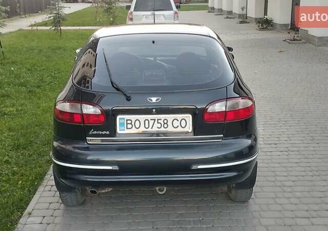 Черный Дэу Ланос, объемом двигателя 1.5 л и пробегом 145 тыс. км за 1950 $, фото 2 на Automoto.ua