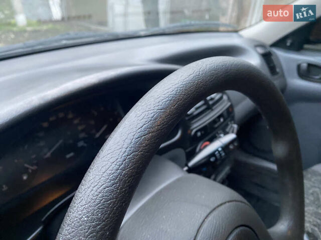 Чорний Деу Ланос, об'ємом двигуна 1.5 л та пробігом 210 тис. км за 3000 $, фото 9 на Automoto.ua