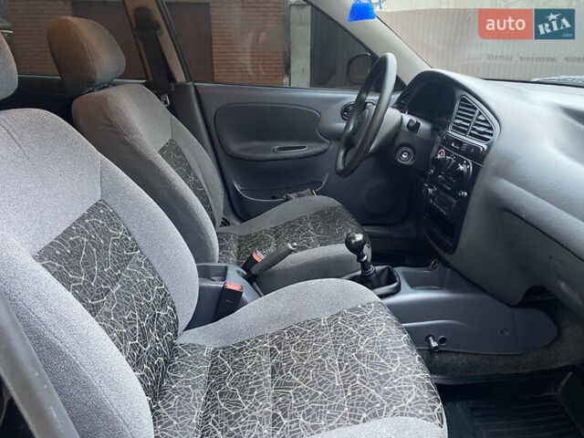 Чорний Деу Ланос, об'ємом двигуна 1.5 л та пробігом 210 тис. км за 3000 $, фото 6 на Automoto.ua