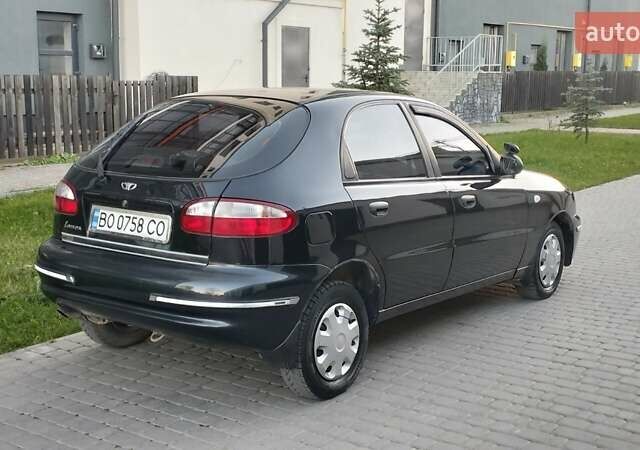 Черный Дэу Ланос, объемом двигателя 1.5 л и пробегом 145 тыс. км за 1950 $, фото 1 на Automoto.ua