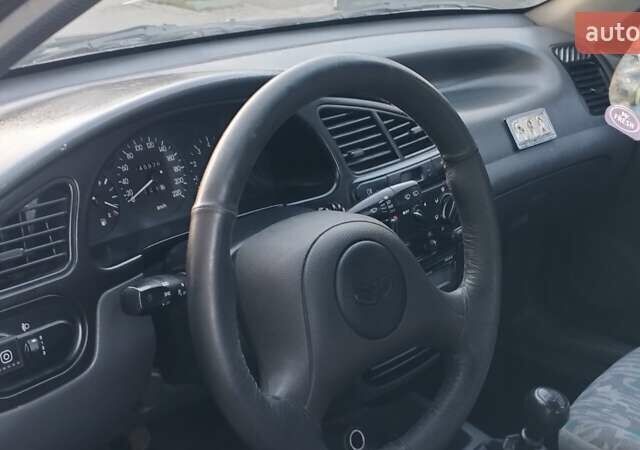 Черный Дэу Ланос, объемом двигателя 1.5 л и пробегом 145 тыс. км за 1950 $, фото 14 на Automoto.ua