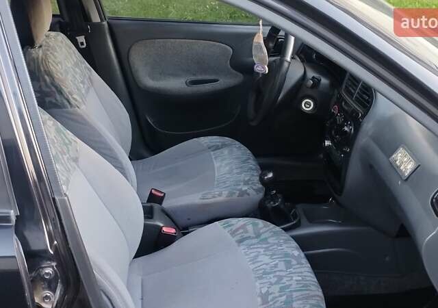 Черный Дэу Ланос, объемом двигателя 1.5 л и пробегом 145 тыс. км за 1950 $, фото 13 на Automoto.ua