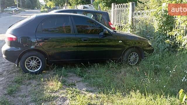 Черный Дэу Ланос, объемом двигателя 1.5 л и пробегом 250 тыс. км за 2300 $, фото 7 на Automoto.ua