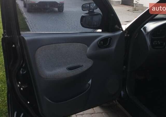 Черный Дэу Ланос, объемом двигателя 1.5 л и пробегом 145 тыс. км за 1950 $, фото 12 на Automoto.ua