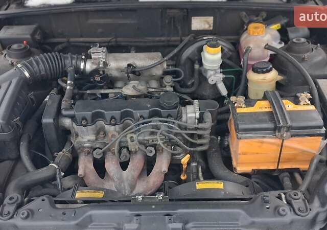 Черный Дэу Ланос, объемом двигателя 1.5 л и пробегом 250 тыс. км за 2300 $, фото 1 на Automoto.ua