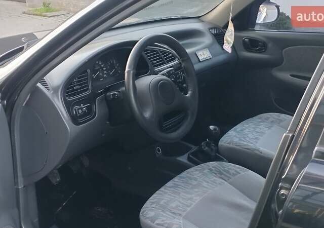 Черный Дэу Ланос, объемом двигателя 1.5 л и пробегом 145 тыс. км за 1950 $, фото 16 на Automoto.ua