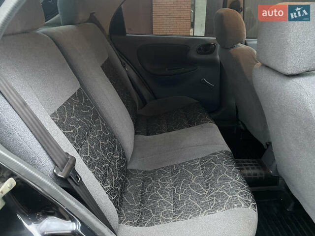 Чорний Деу Ланос, об'ємом двигуна 1.5 л та пробігом 210 тис. км за 3000 $, фото 13 на Automoto.ua