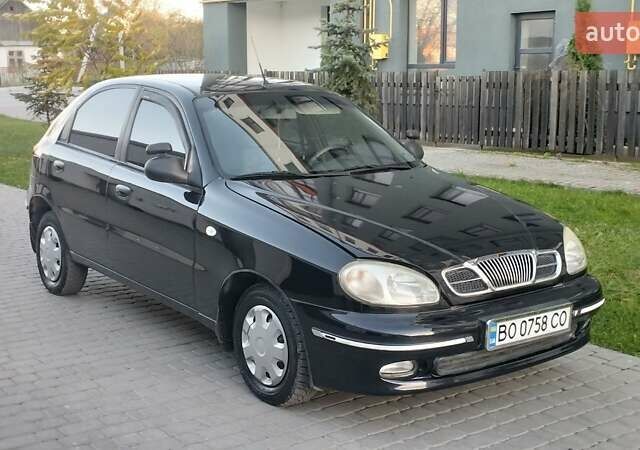 Черный Дэу Ланос, объемом двигателя 1.5 л и пробегом 145 тыс. км за 1950 $, фото 11 на Automoto.ua