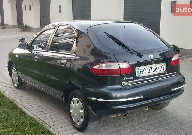 Черный Дэу Ланос, объемом двигателя 1.5 л и пробегом 145 тыс. км за 1950 $, фото 4 на Automoto.ua