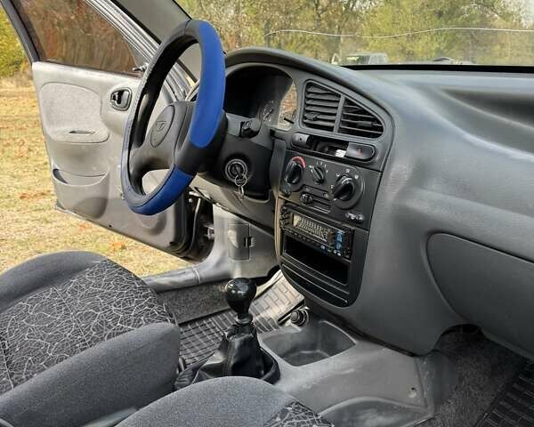 Черный Дэу Ланос, объемом двигателя 1.5 л и пробегом 183 тыс. км за 2500 $, фото 10 на Automoto.ua
