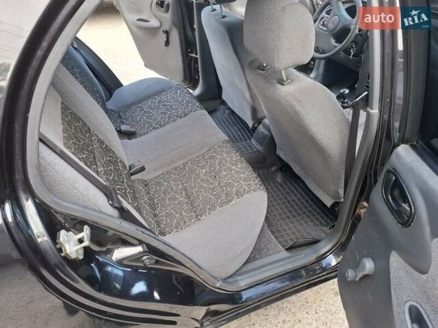 Черный Дэу Ланос, объемом двигателя 1.5 л и пробегом 234 тыс. км за 2900 $, фото 26 на Automoto.ua