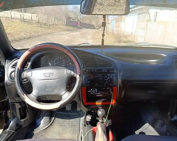 Чорний Деу Ланос, об'ємом двигуна 1.5 л та пробігом 214 тис. км за 2900 $, фото 4 на Automoto.ua
