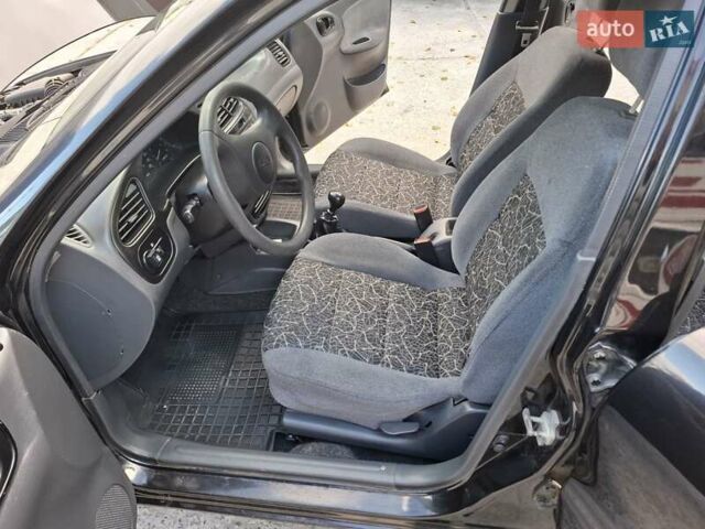 Черный Дэу Ланос, объемом двигателя 1.5 л и пробегом 234 тыс. км за 2900 $, фото 25 на Automoto.ua
