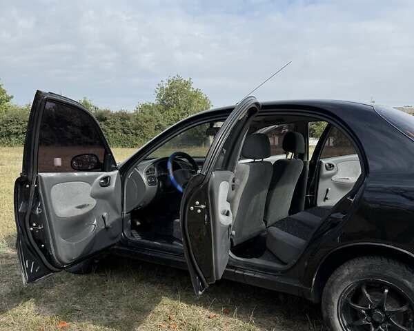 Черный Дэу Ланос, объемом двигателя 1.5 л и пробегом 183 тыс. км за 2500 $, фото 5 на Automoto.ua