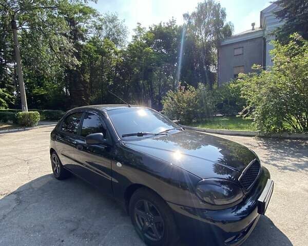 Черный Дэу Ланос, объемом двигателя 1.5 л и пробегом 218 тыс. км за 3400 $, фото 1 на Automoto.ua