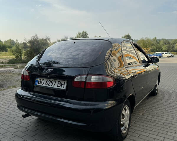Черный Дэу Ланос, объемом двигателя 1.5 л и пробегом 165 тыс. км за 2700 $, фото 1 на Automoto.ua
