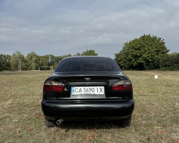 Черный Дэу Ланос, объемом двигателя 1.5 л и пробегом 183 тыс. км за 2500 $, фото 3 на Automoto.ua