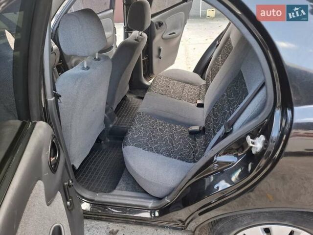 Черный Дэу Ланос, объемом двигателя 1.5 л и пробегом 234 тыс. км за 2900 $, фото 19 на Automoto.ua
